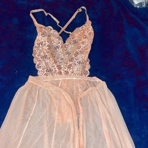 Salmon pink bodysuit and skirt